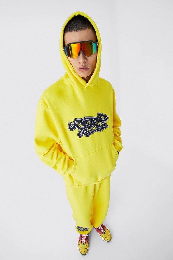 Oversize Worldwide Trainingsanzug mit Graffiti-Print und Kapuze