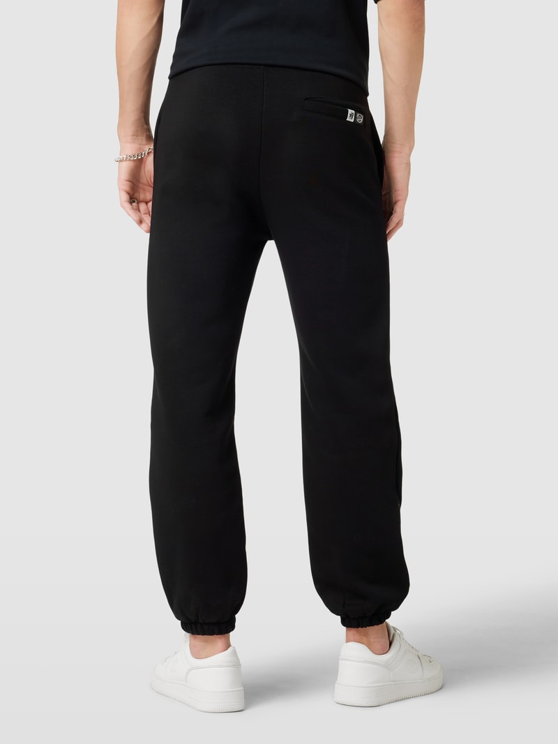 Sweatpants mit Label-Print in schwarz