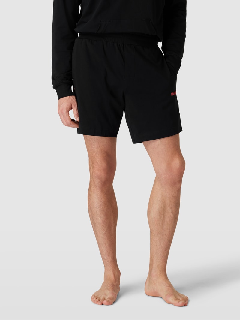 Shorts mit elastischem Bund und Label-Detail in schwarz