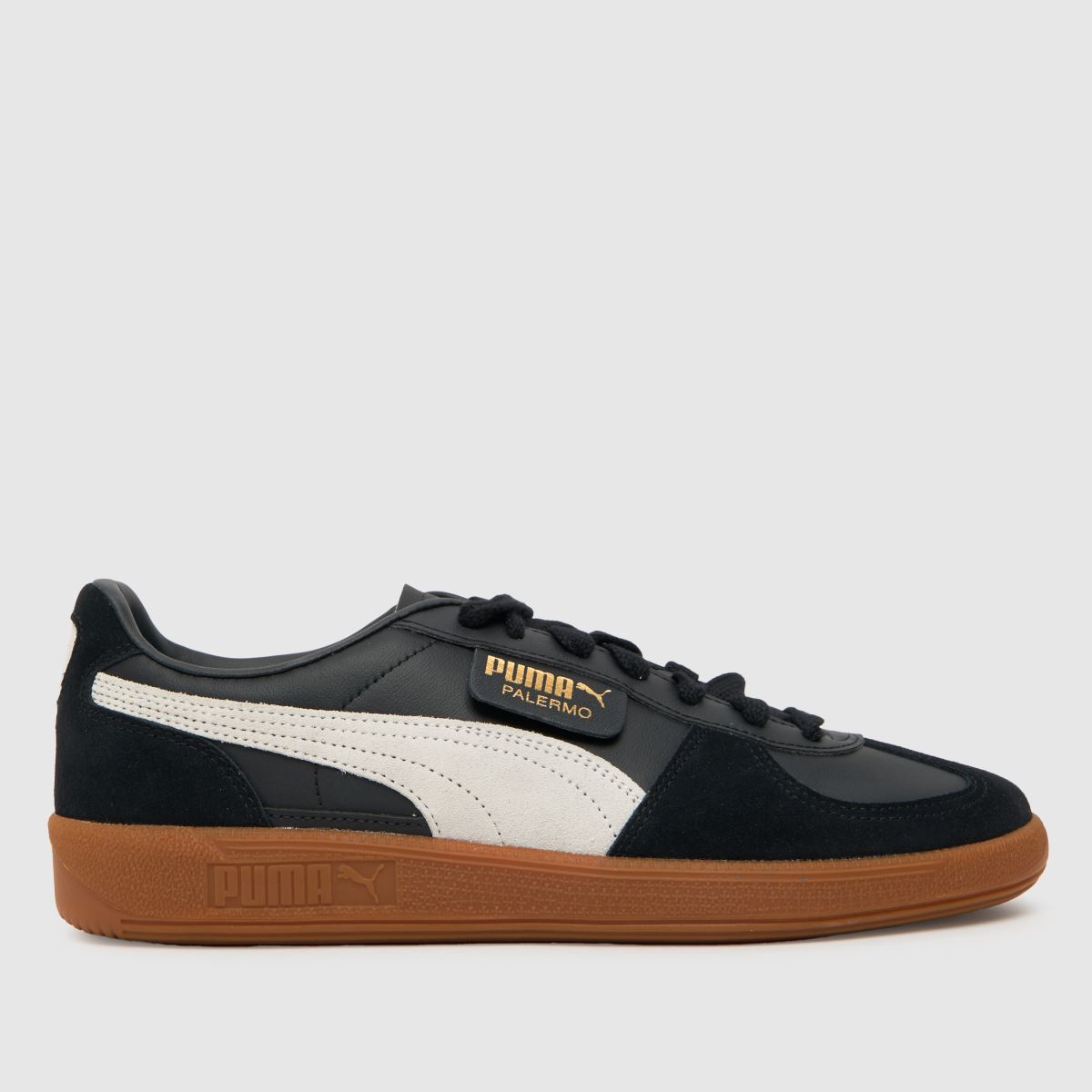 PUMA Palermo lädersneakers i svart och vitt