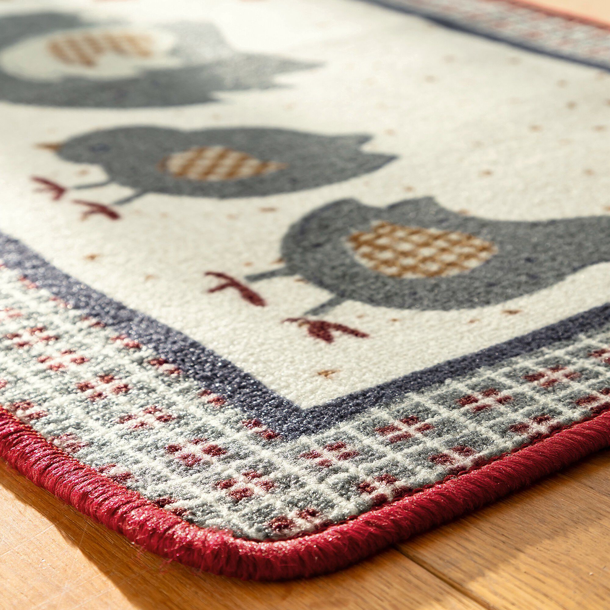 Tapis cuisine motif cocotte et ses poussins