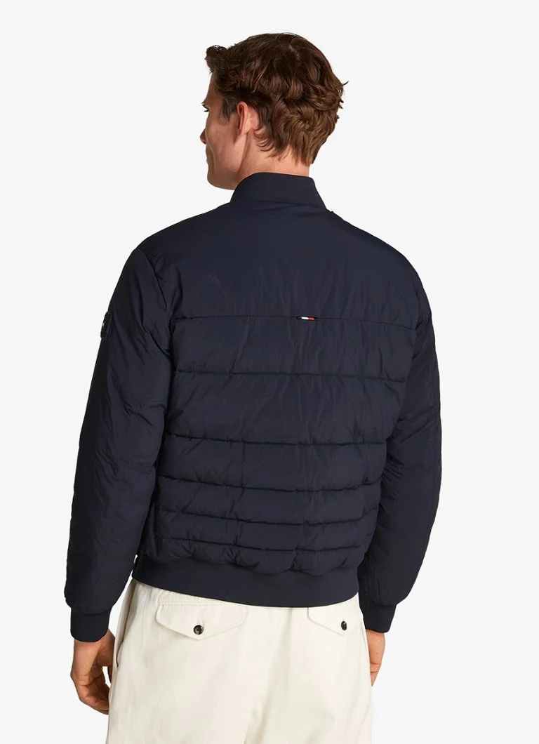 Jachetă bomber matlasată Tommy Hilfiger cu buzunare cu fermoar și logo