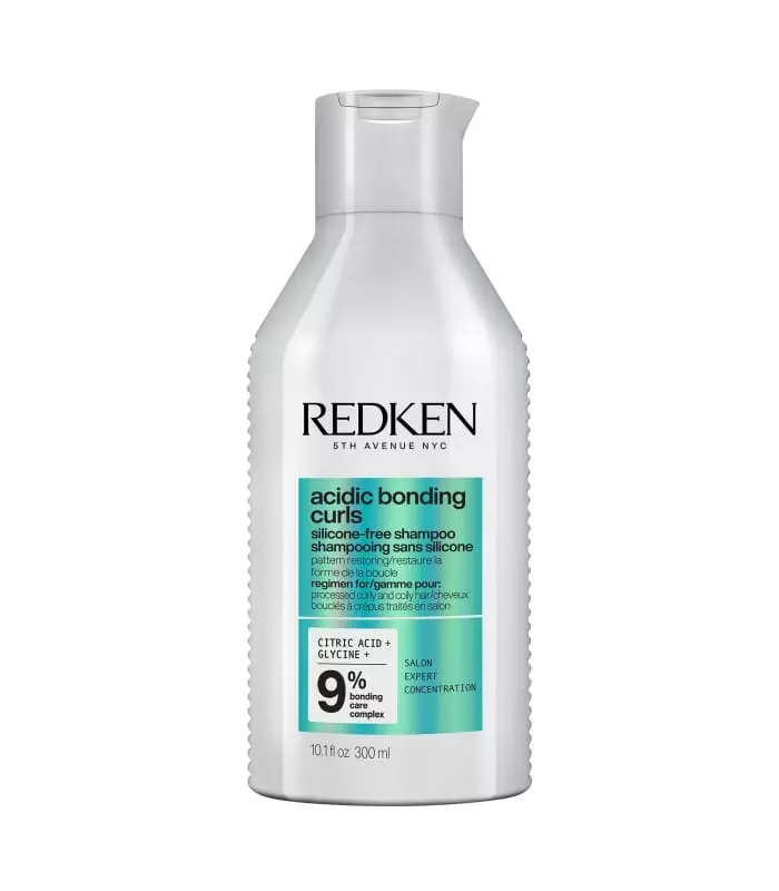 ACIDIC BONDING CURLS Shampoing régénérant pour cheveux bouclés