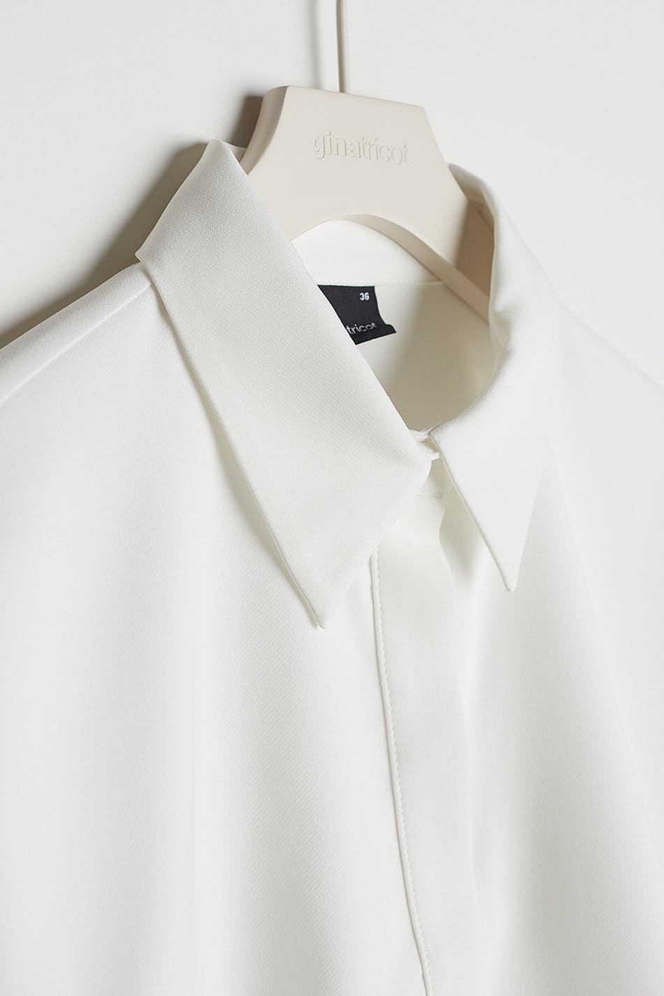 Mira open back shirt