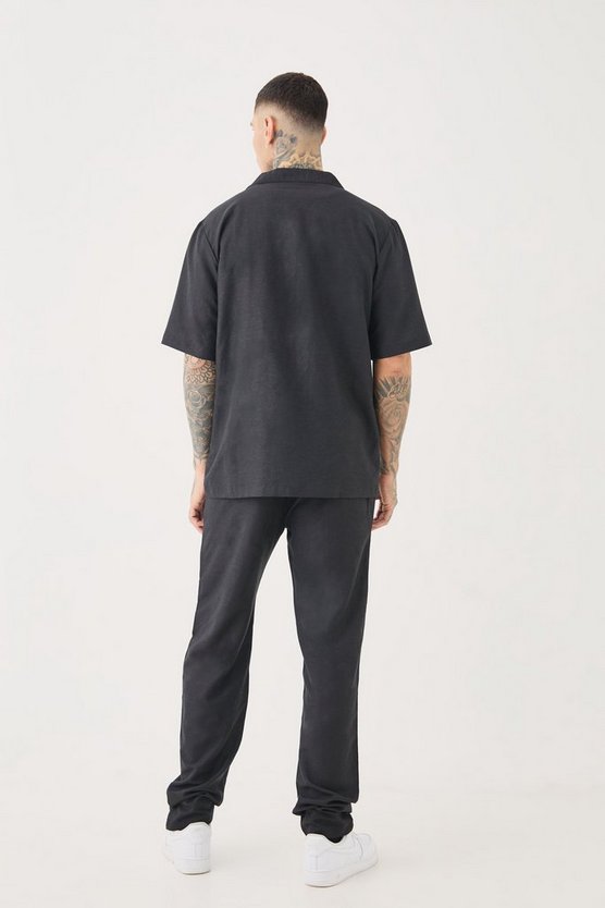 Tall schwarzes besticktes Leinen-Hemd