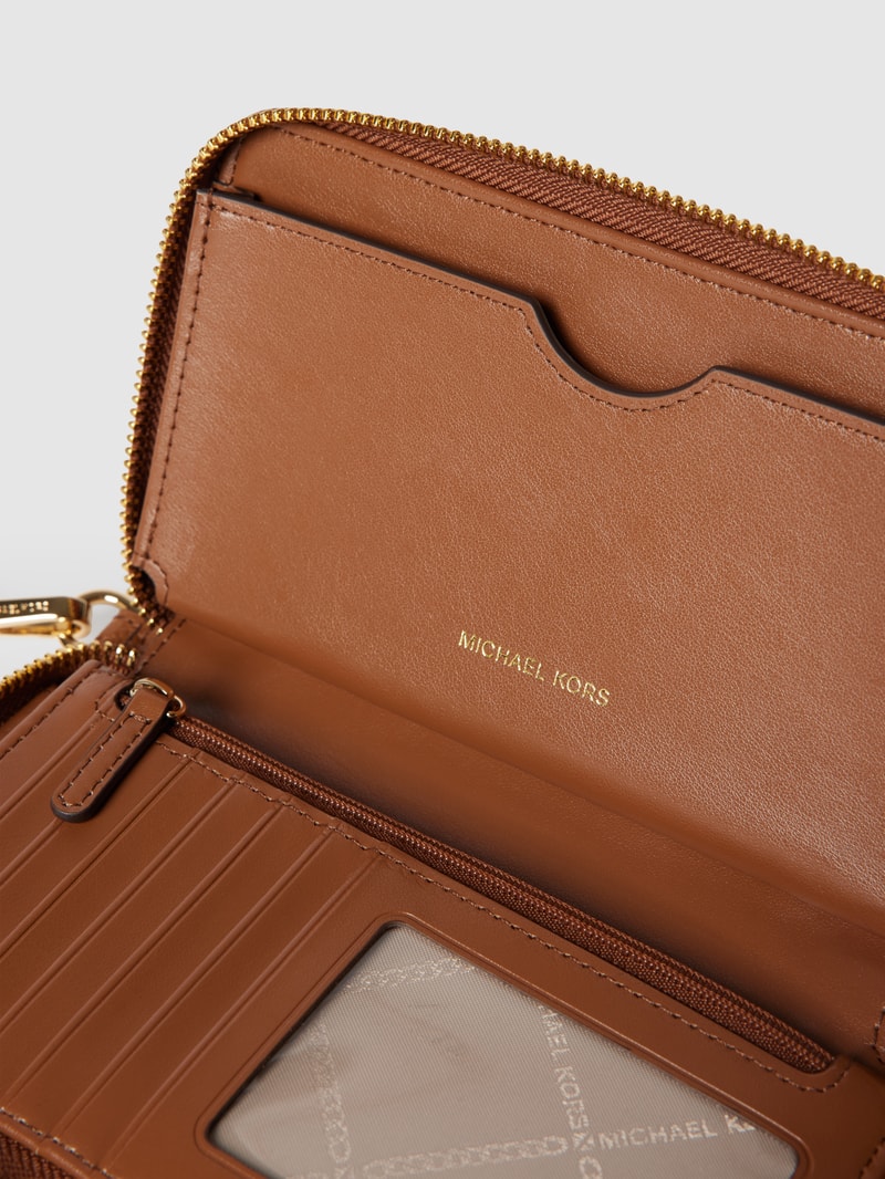 Portemonnaie mit Label-Schriftzug Modell 'JET SET' in cognac