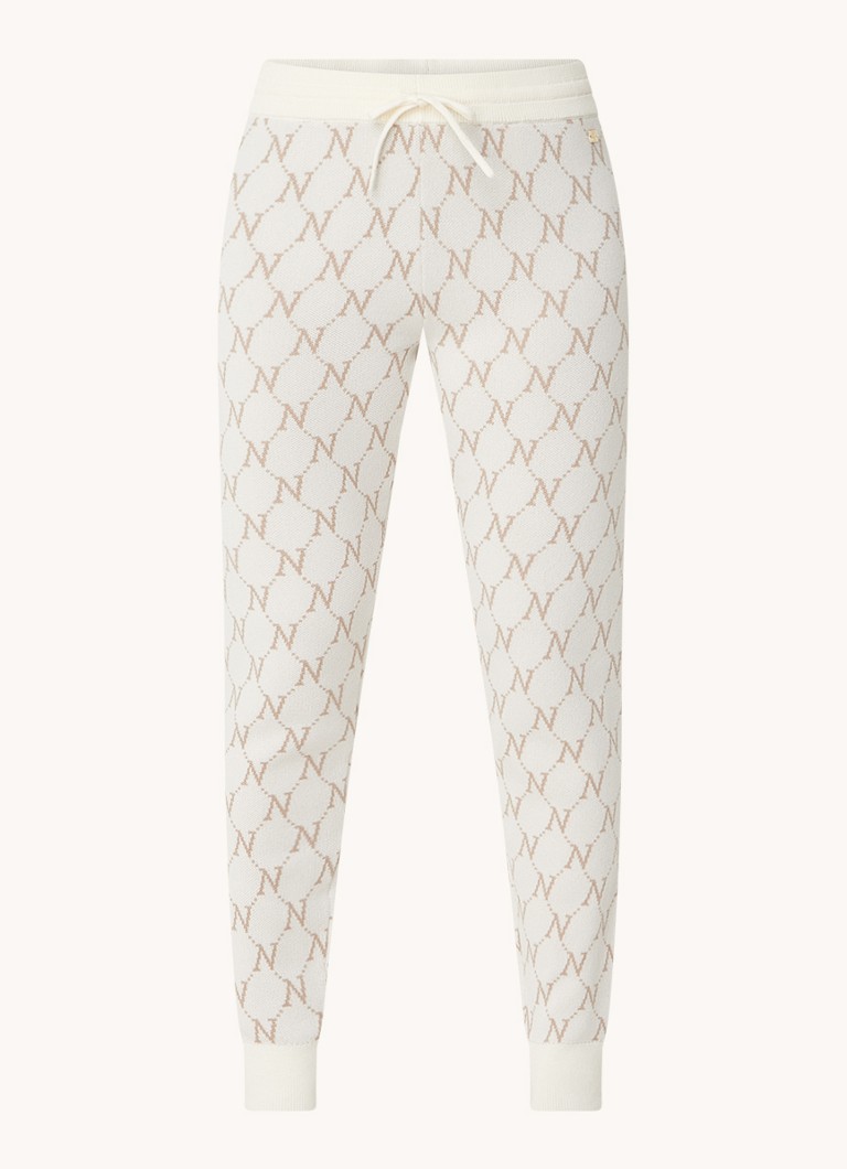 Pantaloni NIKKIE Brisbane slim fit, cu talie medie și imprimeu tricotat cu logo.