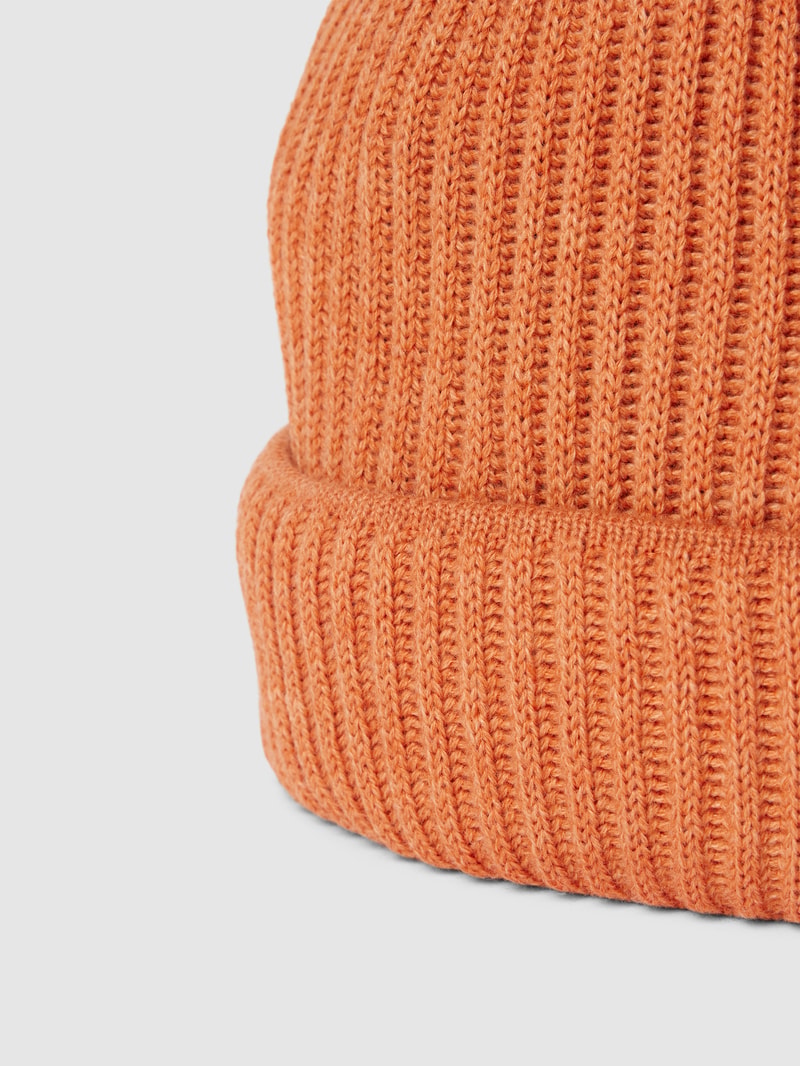 Beanie mit Umschlag aus Schurwoll-Mix in orange