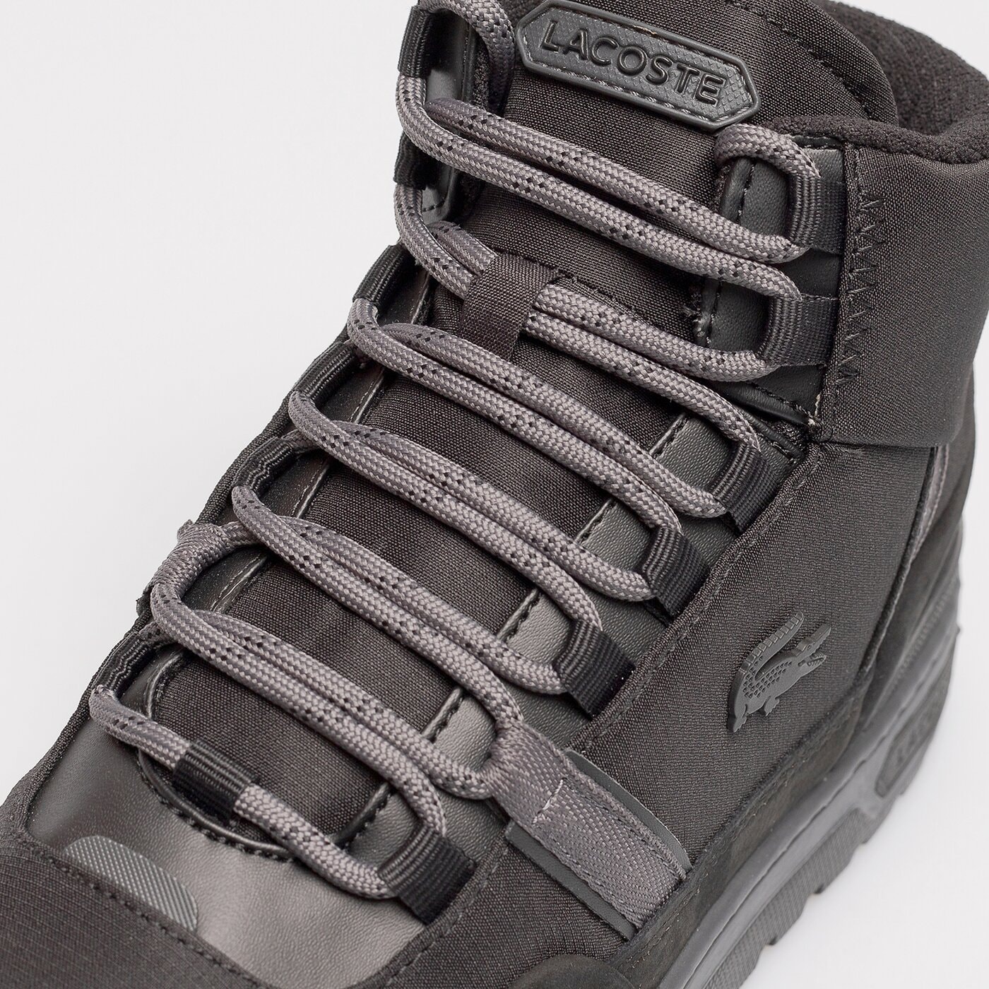 LACOSTE T-CLIP WNTR MID 222 2 Schwarz
