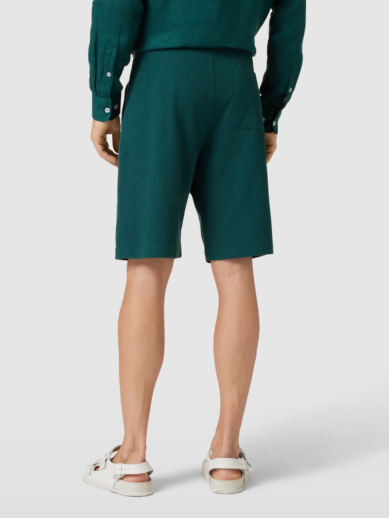 Shorts in unifarbenem Design Modell 'Waffle' in petrol