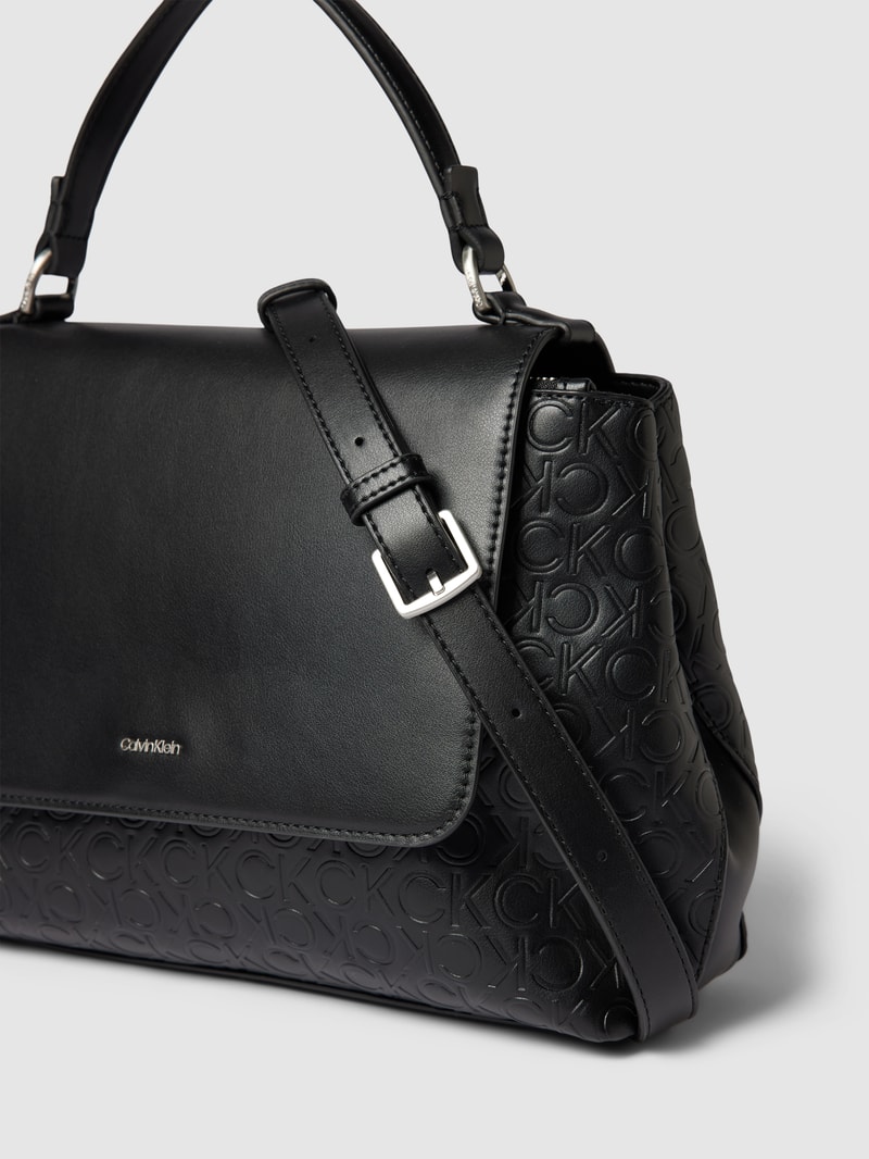 Handtasche mit verstellbarem Schulterriemen in schwarz