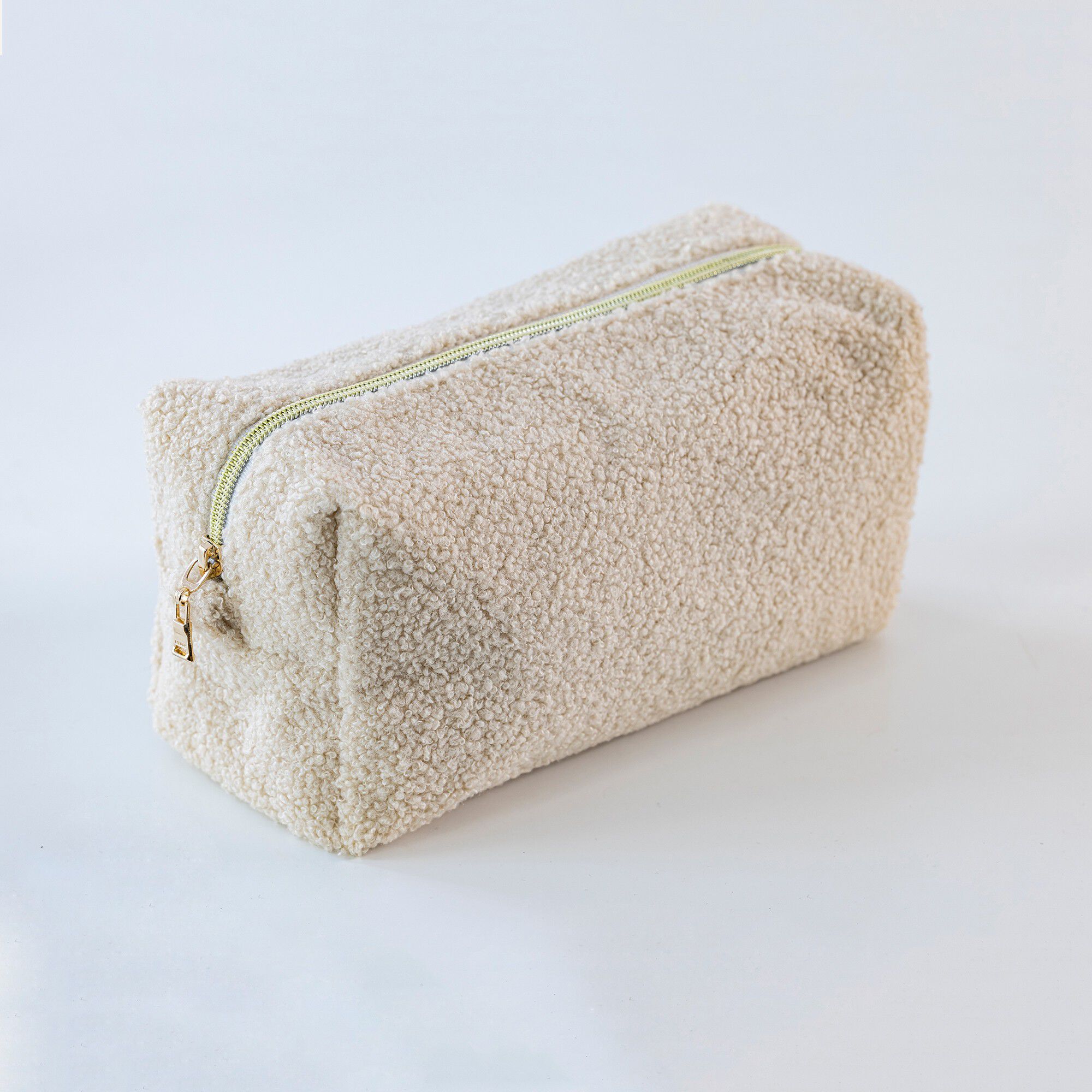 Trousse de toilette en bouclette sherpa