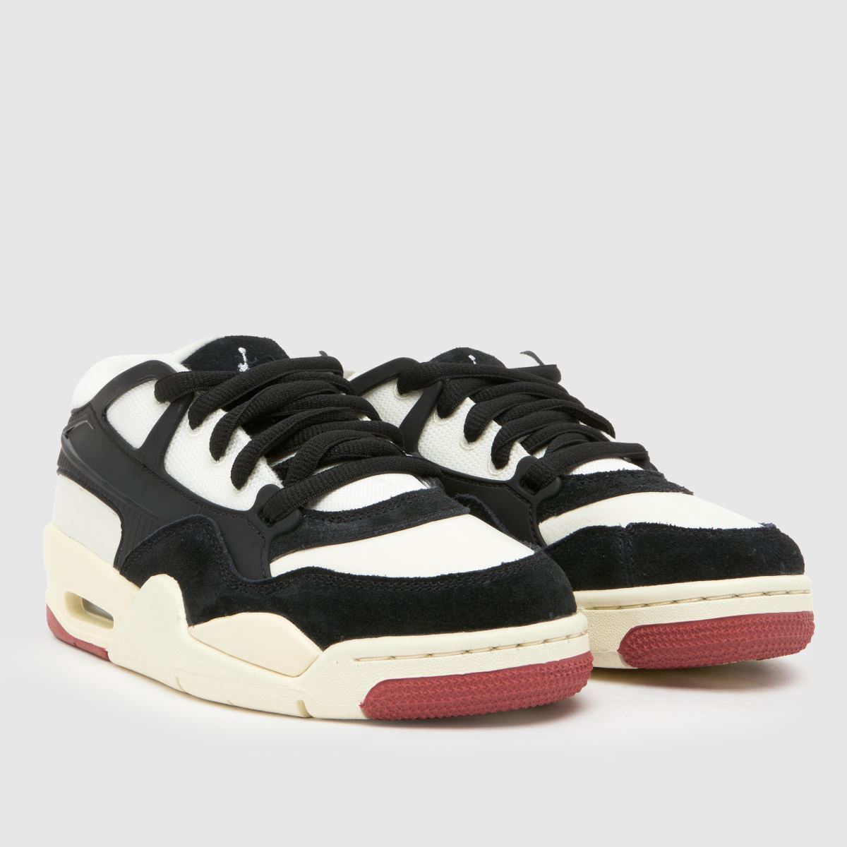 Nike Jordan svarta och vita 4 rm ungdomsskor