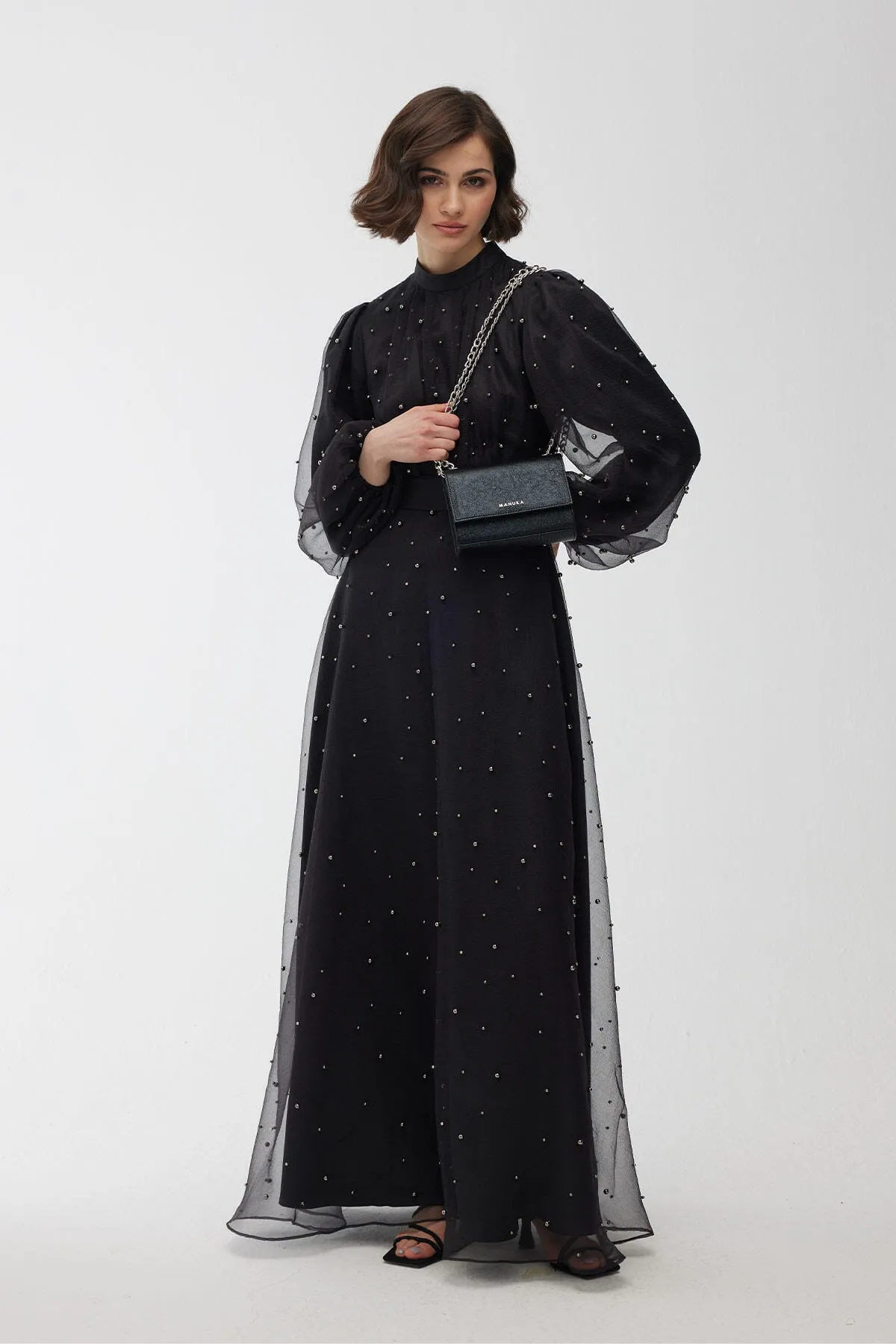 Manuka  Abendkleid mit Tüll und Perlendetails in Schwarz