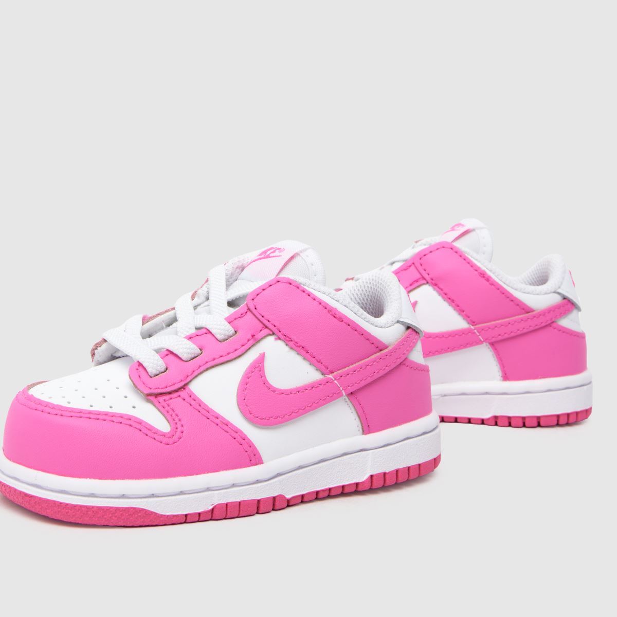 Belo-roza superge Nike Dunk Low za deklice z motivom malčka