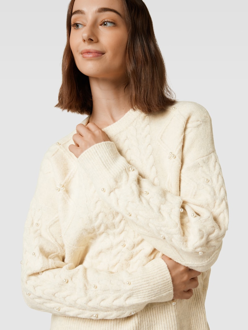 Strickpullover mit Zopfmuster in ecru