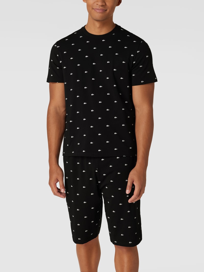 Pyjama mit labeltypischem Allover-Print in schwarz
