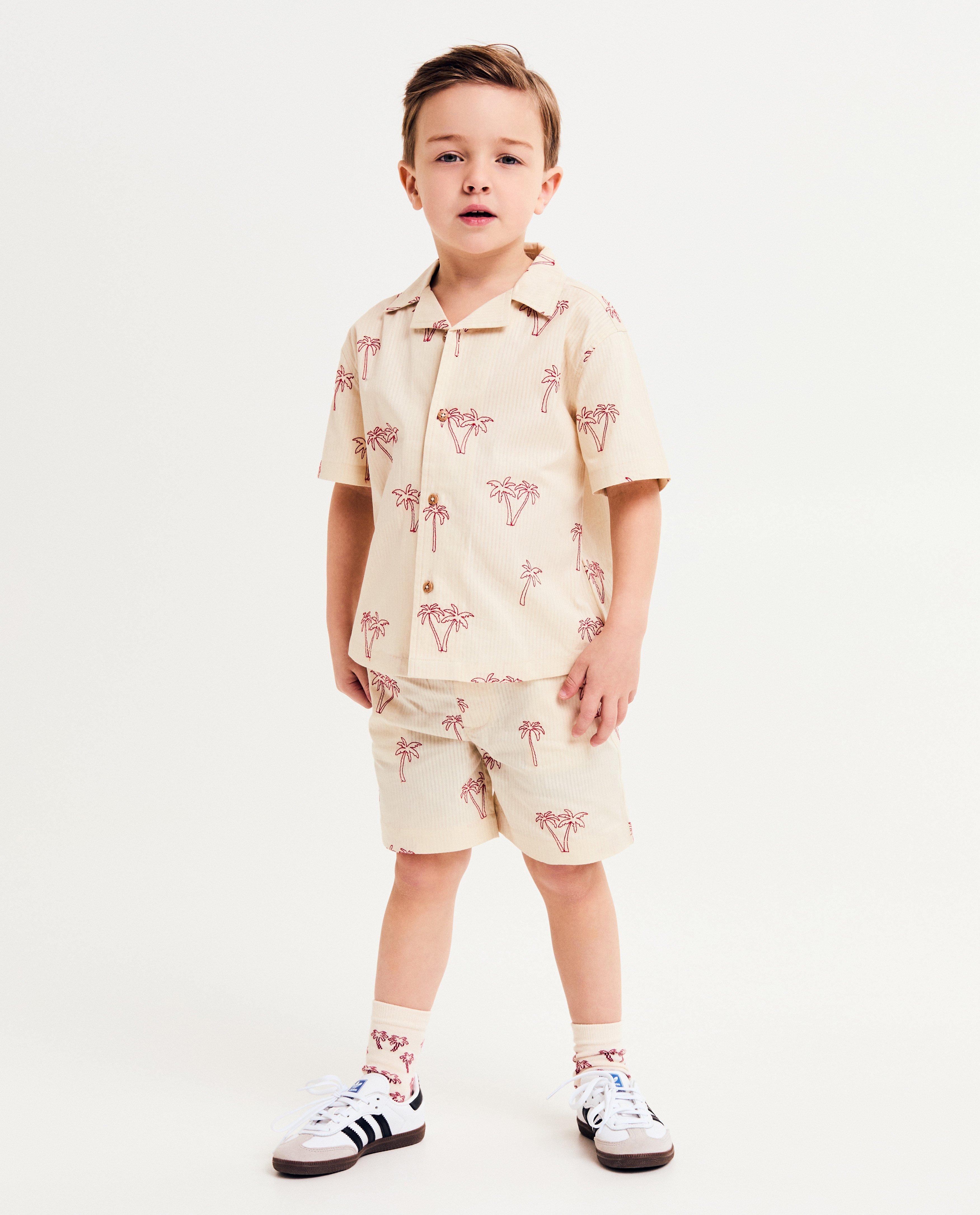 Pantaloni scurți Kidz Nation cu palmieri brodați bej