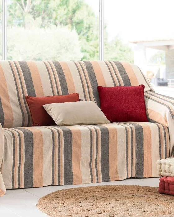 Jeté de fauteuil ou de canapé uni et rayé