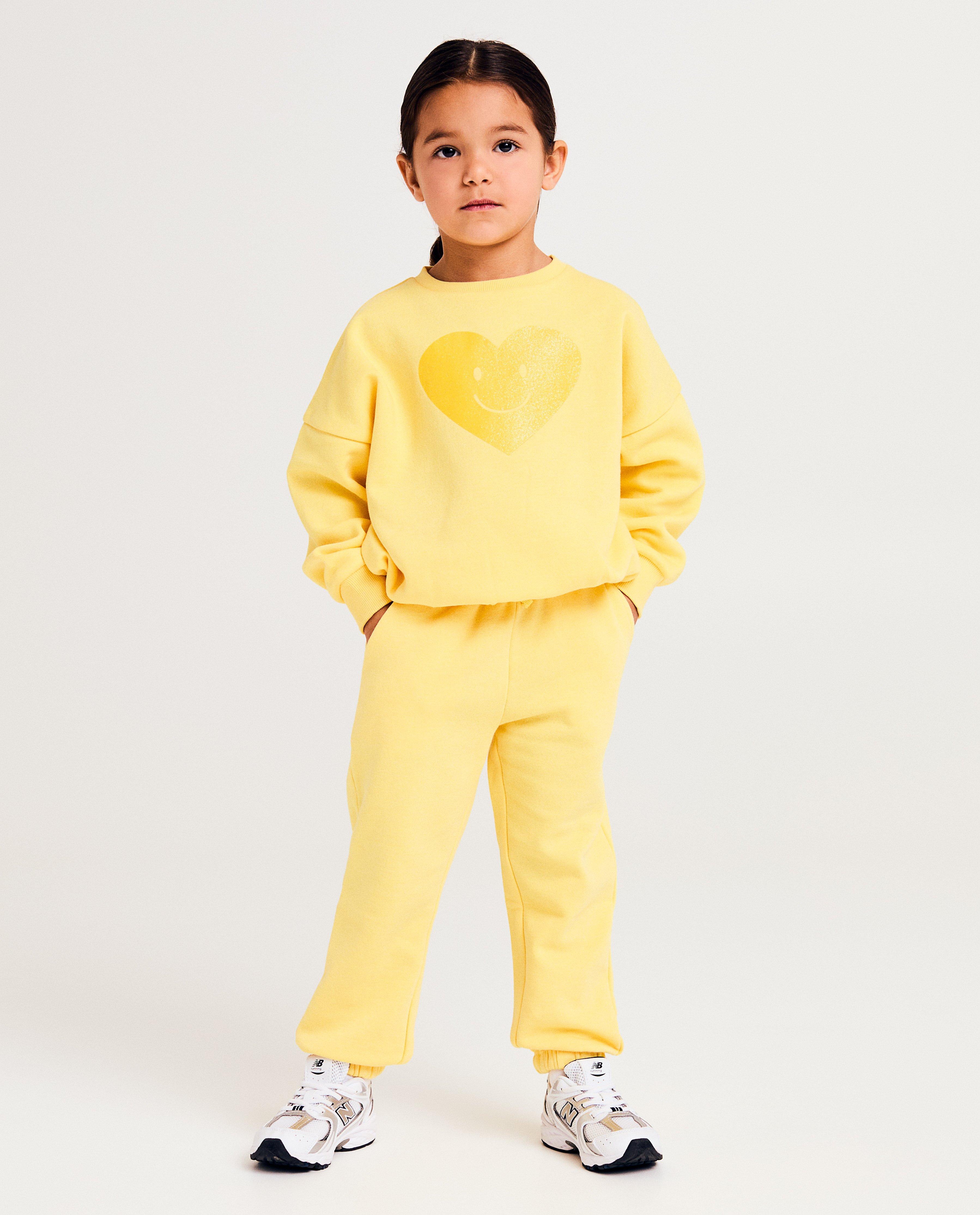 Pantaloni de trening galbeni Besties