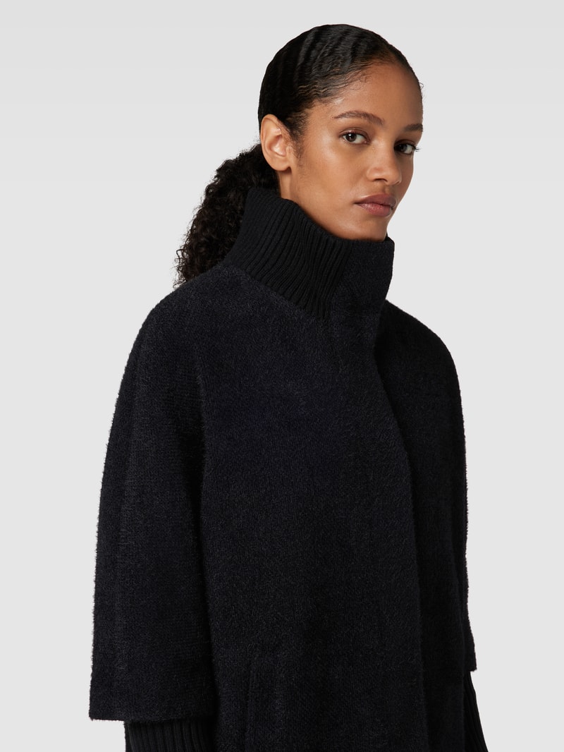Strickjacke mit Druckknopfverschluss in schwarz