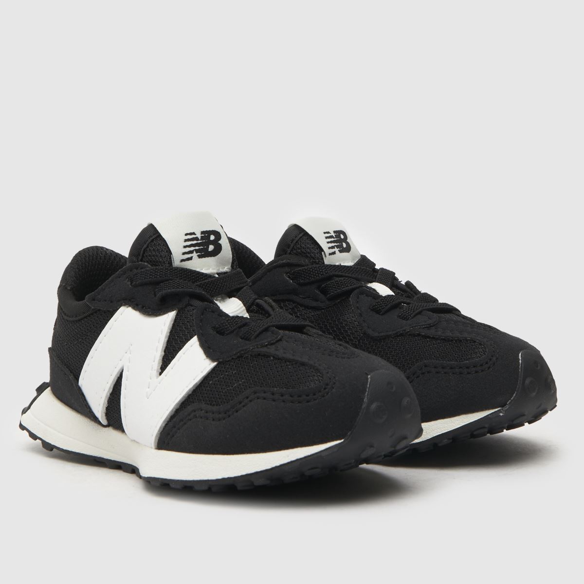 New Balance svarta och vita 327 småbarnsskor