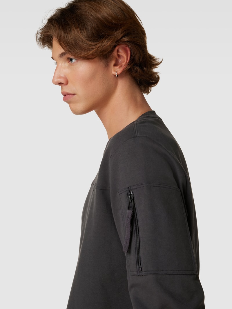 Sweatshirt mit Reißverschlusstasche am Ärmel in anthrazit
