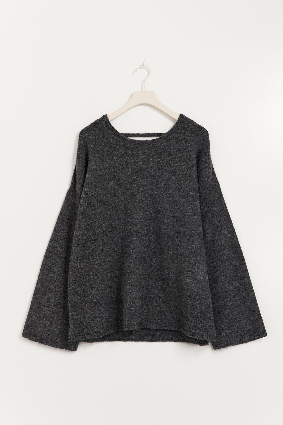 Open back knitted sweater