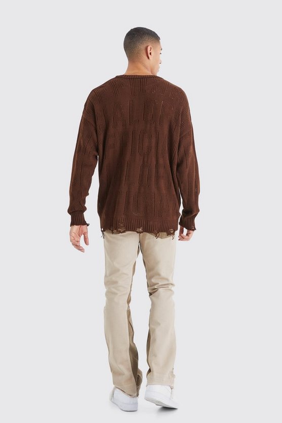 Zerrissene Slim-Fit Schlaghose mit Applikation