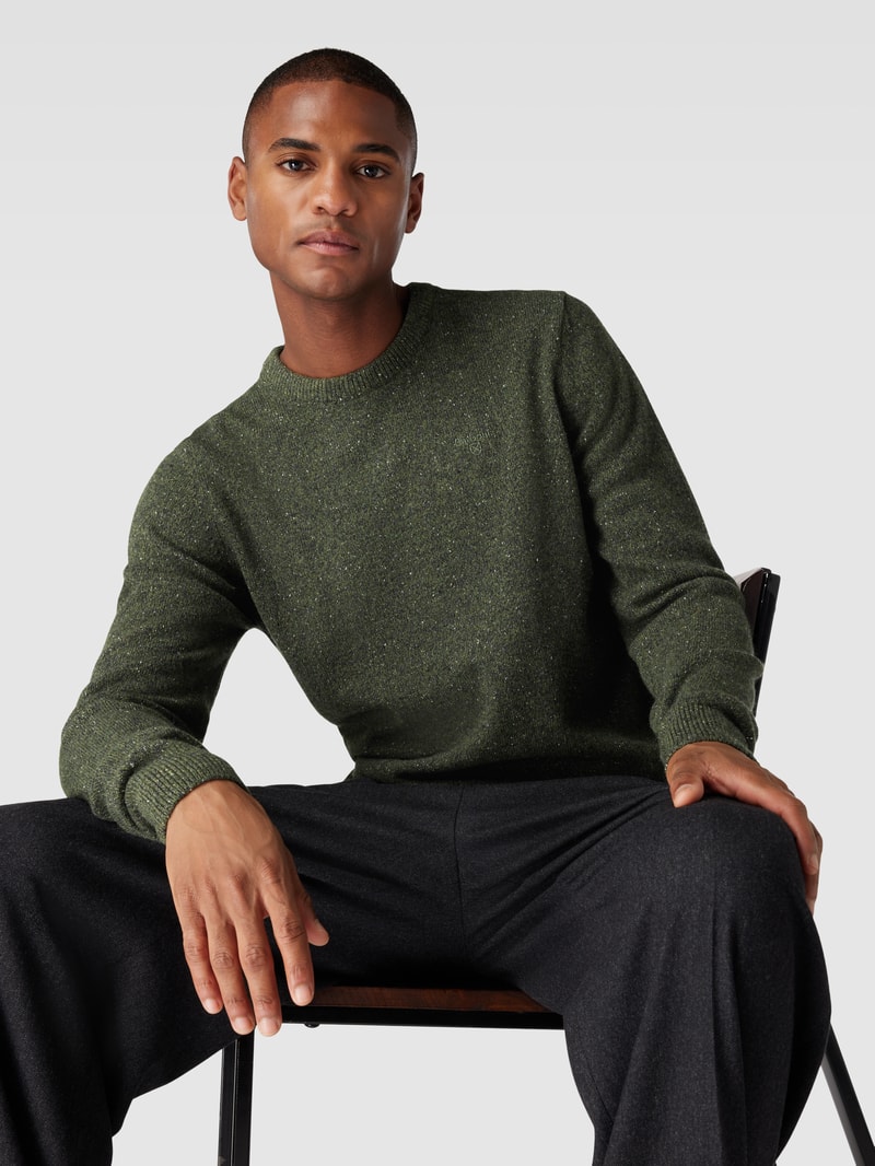 Strickpullover in Melange-Optik aus Woll-Mix mit Seiden-Anteil in dunkelgrün