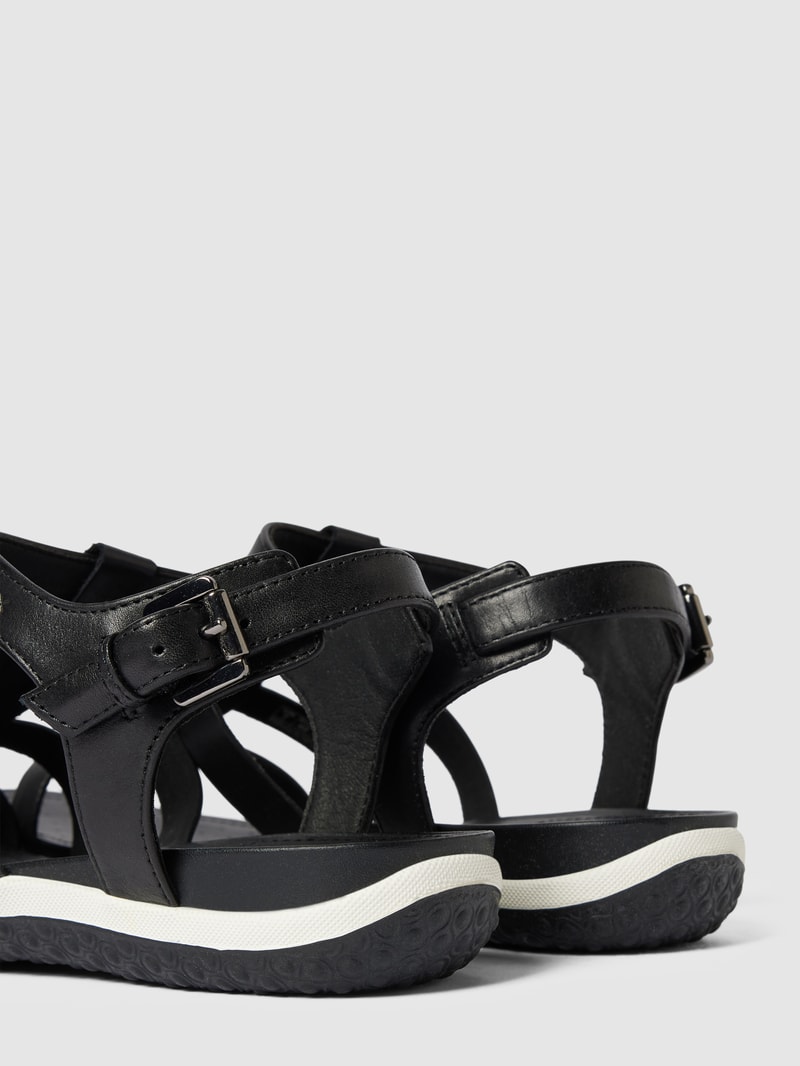 Sandalen mit Dornschließe in metallic in schwarz