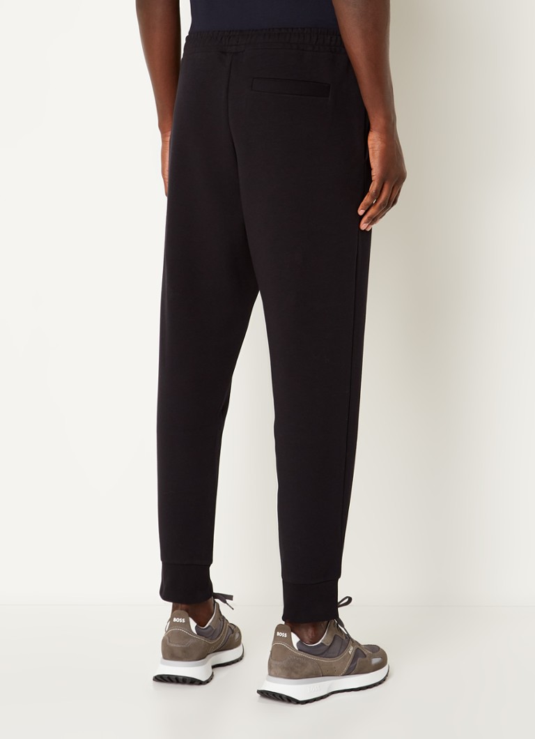 Calça de jogging HUGO BOSS Hadiko com corte afunilado e bolsos com costura.