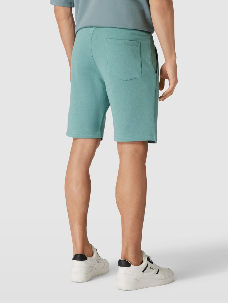 Sweatshorts mit französischen Eingrifftaschen in helltürkis