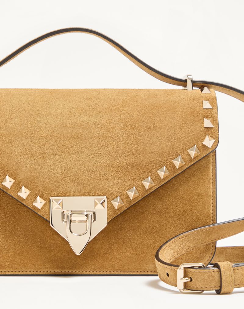 Bolsa de ombro pequena Valentino Garavani Rockstud em camurça