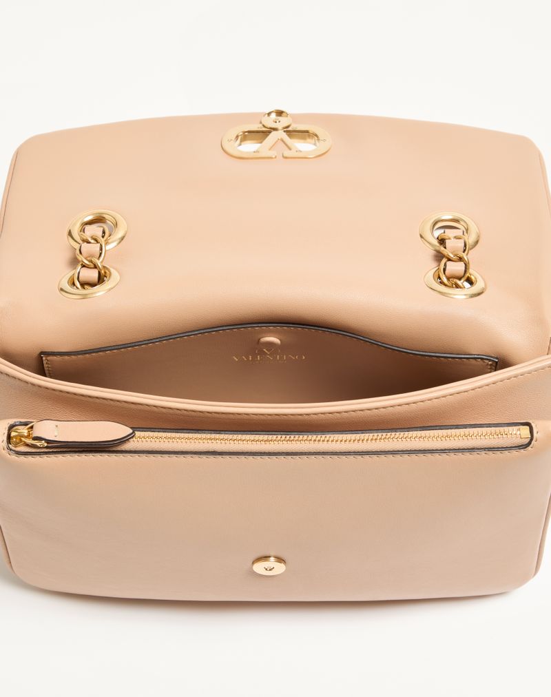 Bolsa Valentino Garavani Djuna com corrente média em couro napa