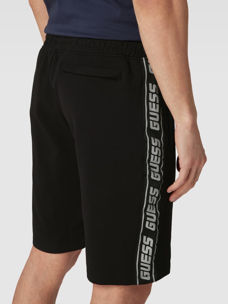 Sweatshorts mit Galonstreifen in schwarz