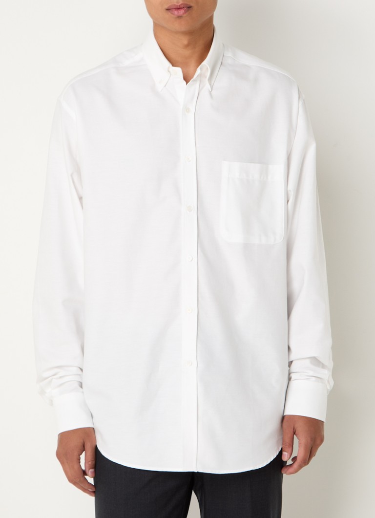 Camisa oversized Sinclair da Frankie Shop com bolso no peito.