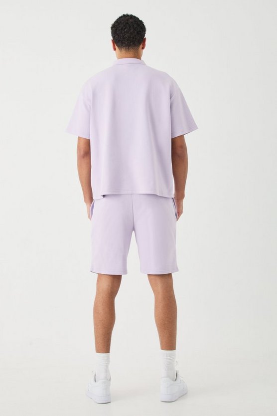 Besticktes Oversize Poloshirt mit 1/4 Reißverschluss & Shorts