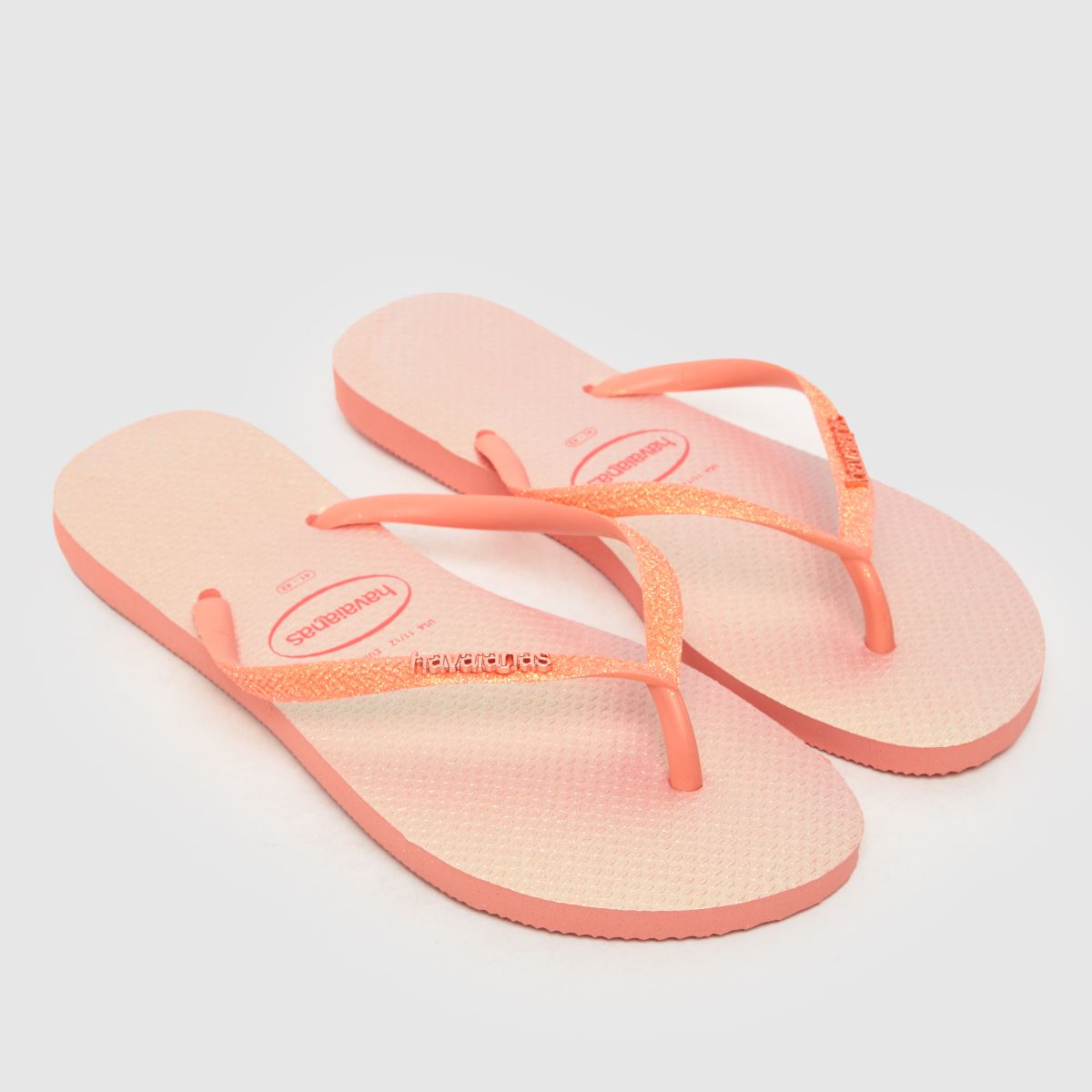 Havaianas – Persikafärgade smala glitter-sandaler med skimrande look