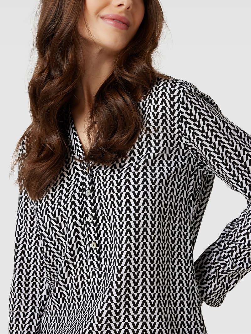 Blusenshirt mit Allover-Muster in schwarz