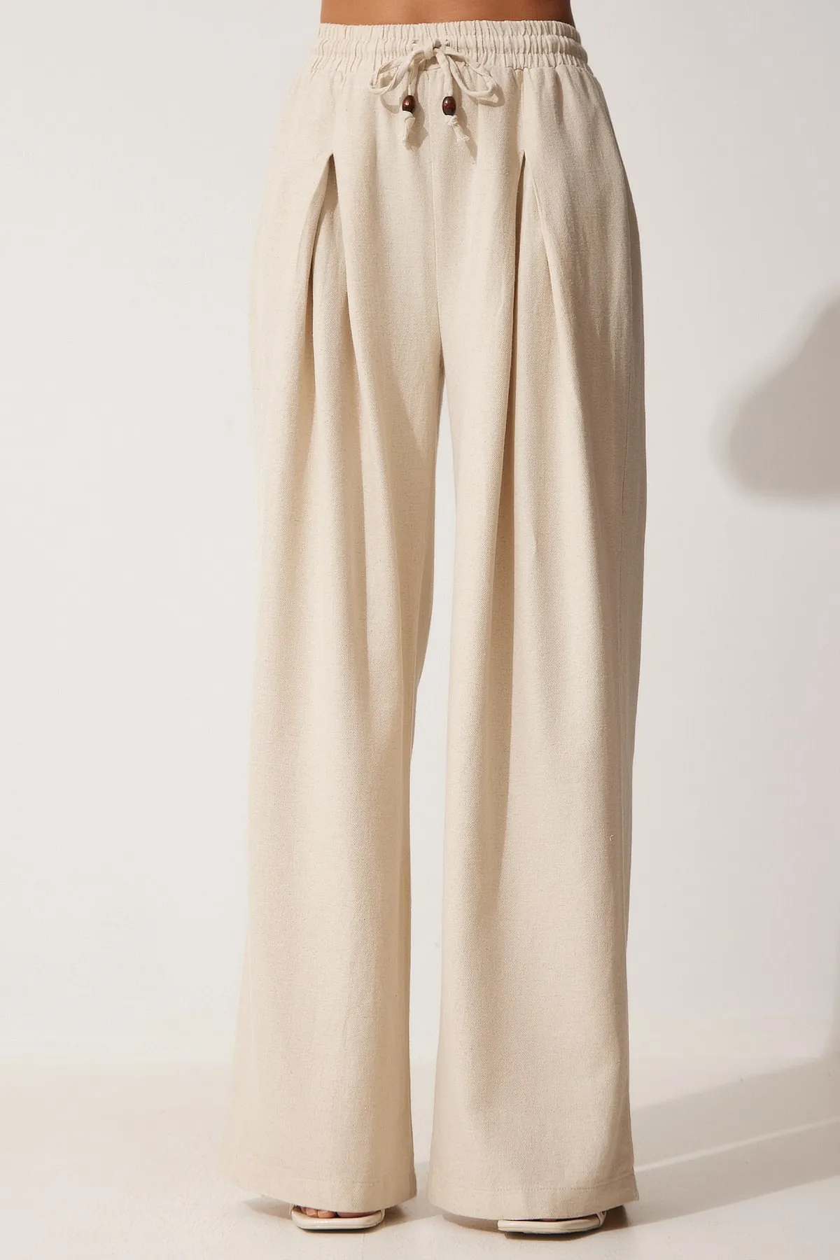 Happiness İstanbul  Cremefarbene lockere Palazzo-Hose aus Rohleinen für Damen NS00388
