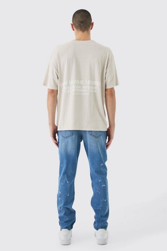 Slim-Fit Jeans mit Farbdetail und Riss am Knie