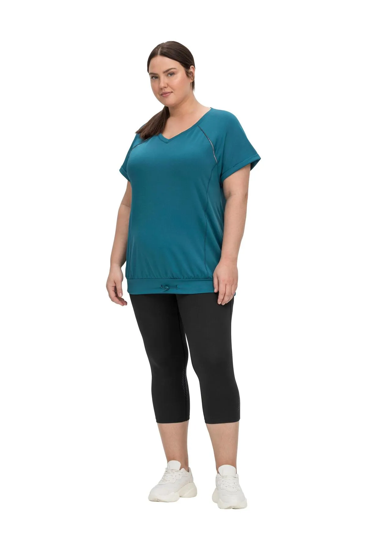 Sheego  Sport-Leggings - Schwarz - Mittlerer Bund