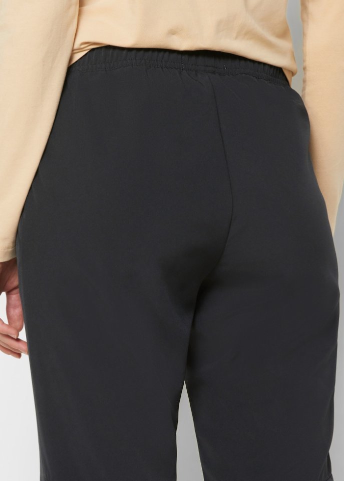 Schnelltrocknende Sporthose mit Reißverschlusstaschen, knöchelfrei