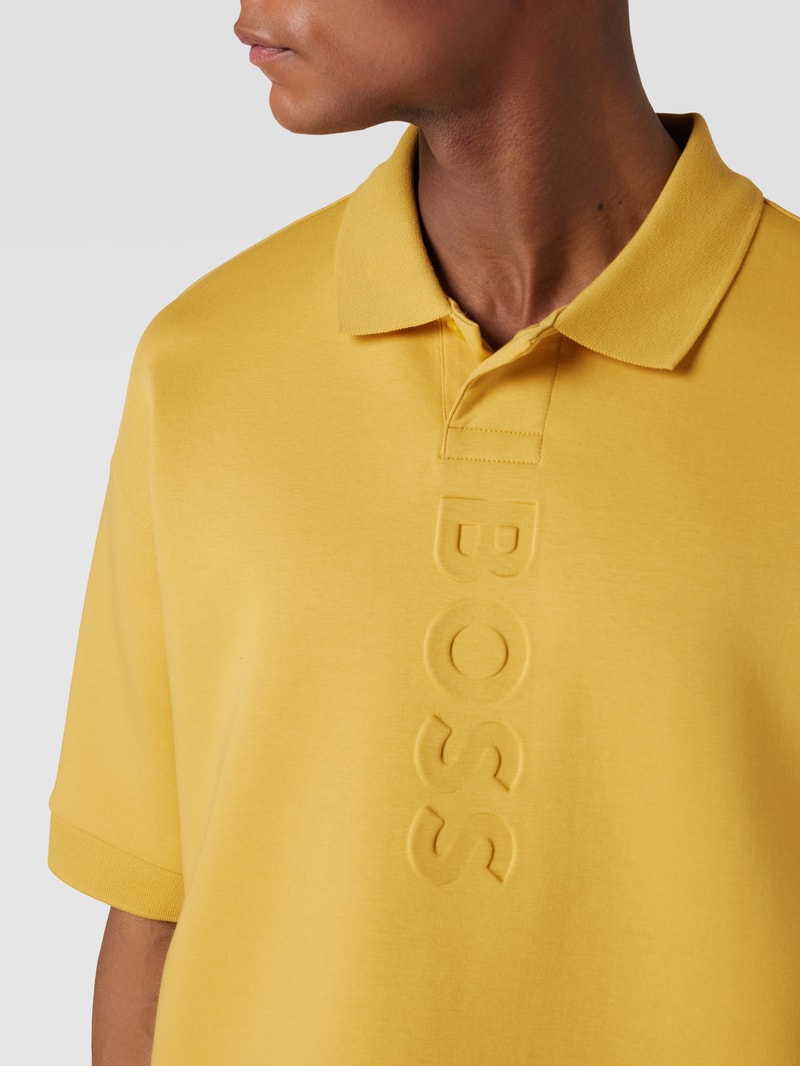 Relaxed Fit Poloshirt mit Marken-Detail Modell 'Pirax' in dunkelgelb