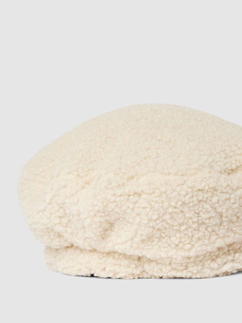 Mütze aus Teddyfell mit verstärktem Schirm in beige