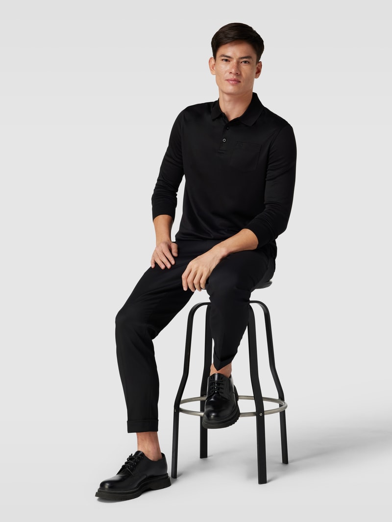 Poloshirt mit Brusttasche in schwarz