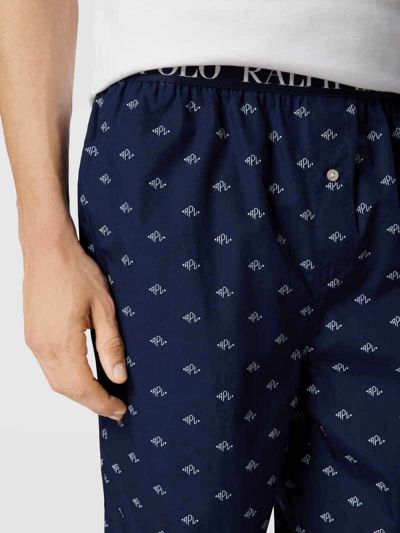 Pyjama-Hose mit Allover-Logo Modell 'LOGO' in dunkelblau