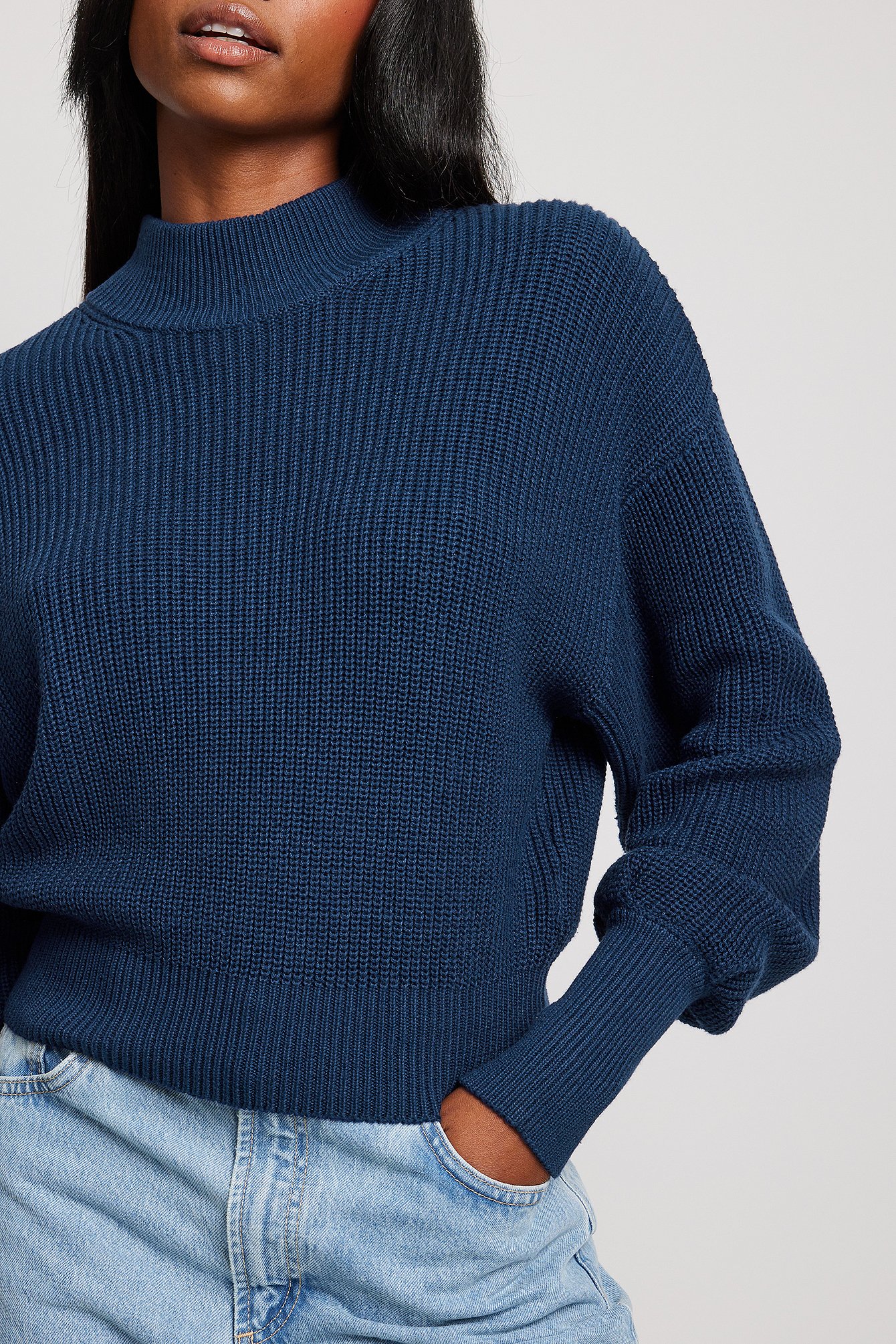 Strickpulli mit weiten Ärmeln