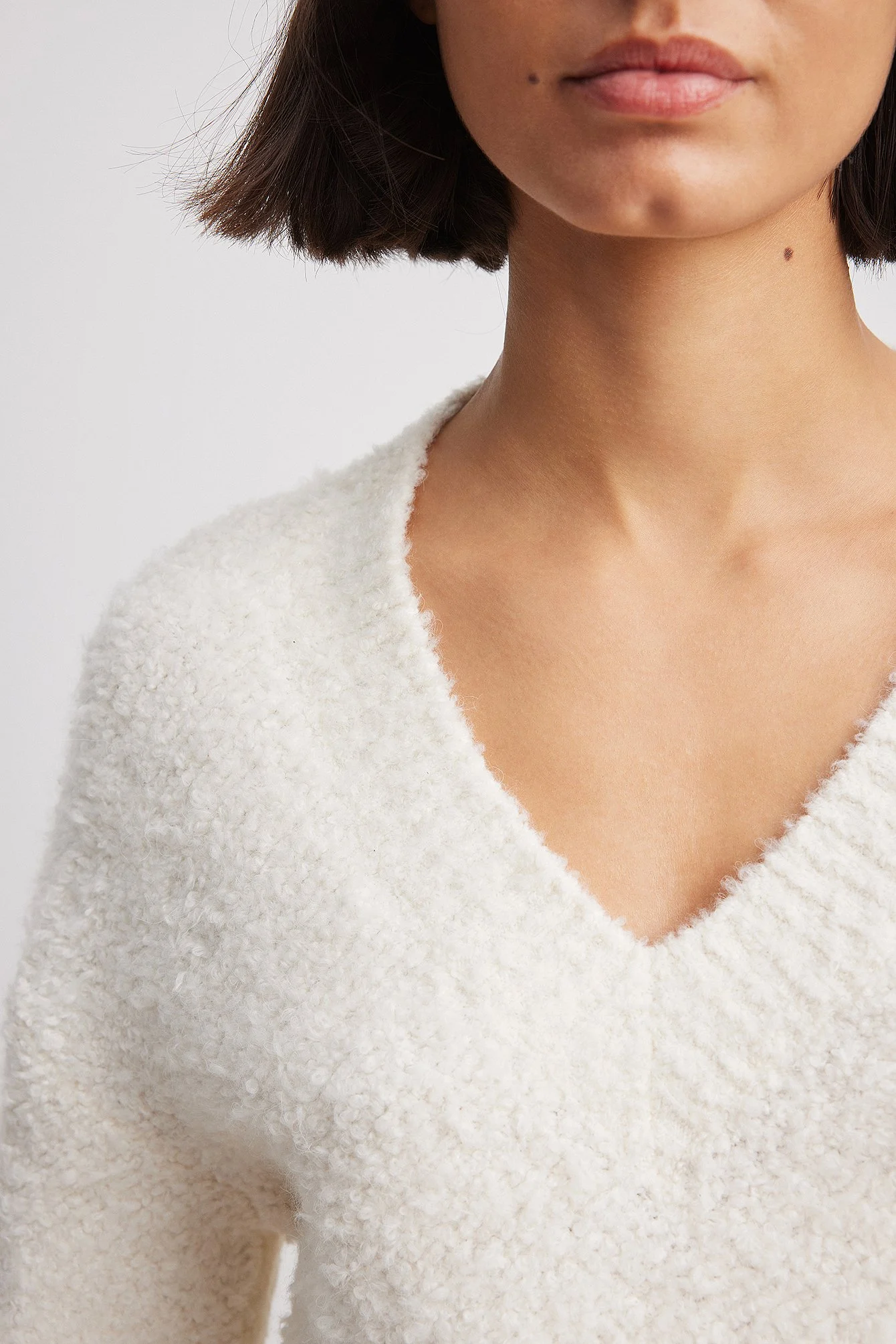 Crop-Strickpullover mit V-Ausschnitt